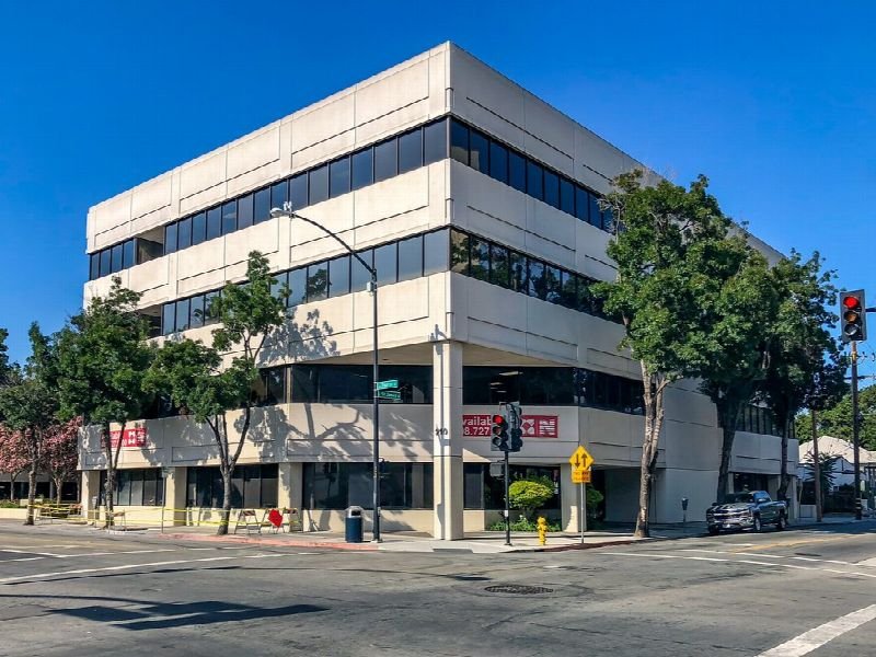 Multi-story office building on a sunny day