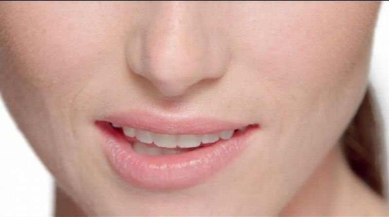 Close-up of a smile with white teeth