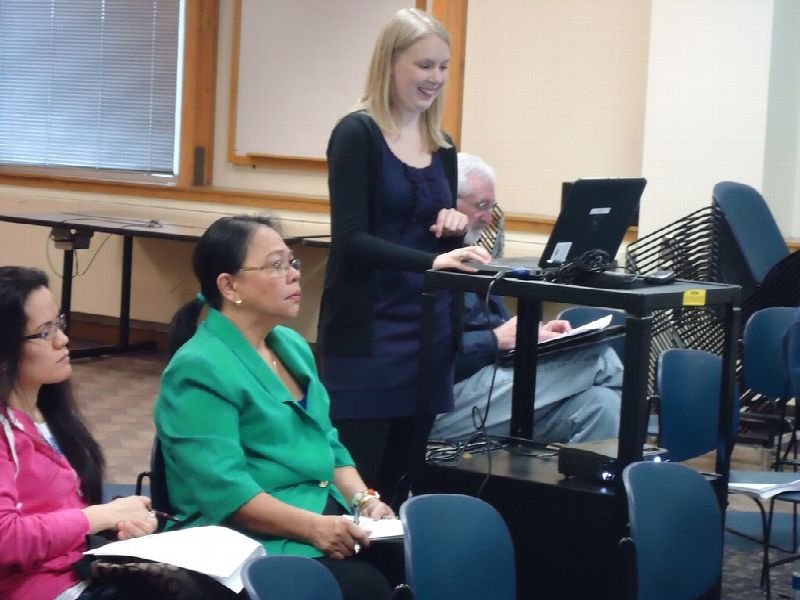Professionals in a meeting at an office conference table