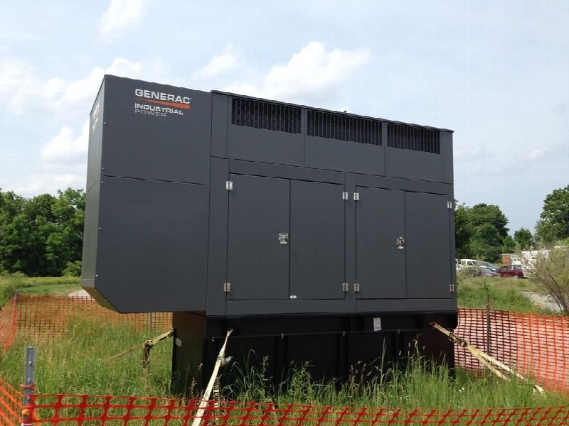 Standby generator enclosure installed outside a building