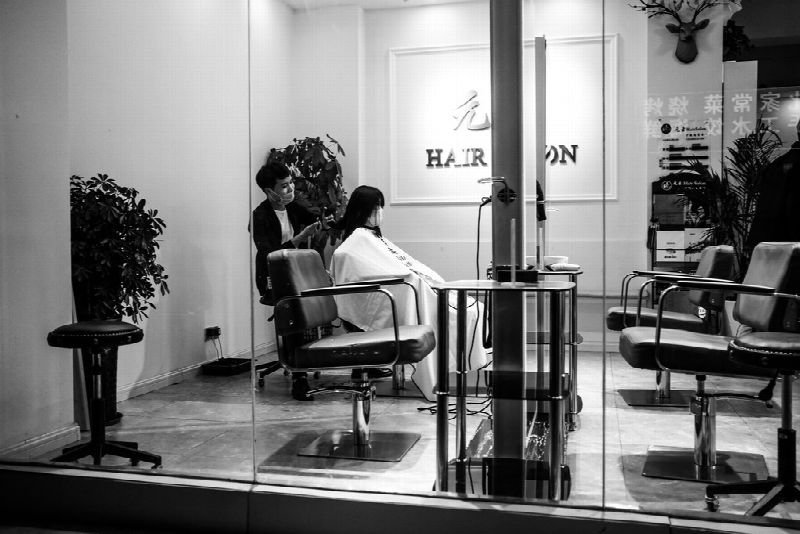 Hair salon with styling chairs and mirrors