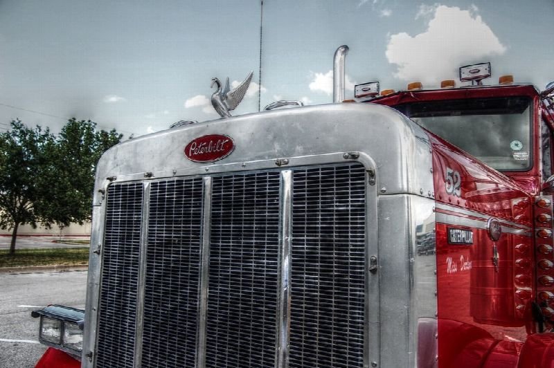 Front grille of a red semi truck
