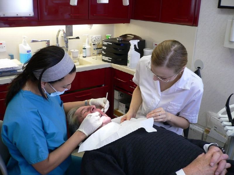 Dental team treating a young patient